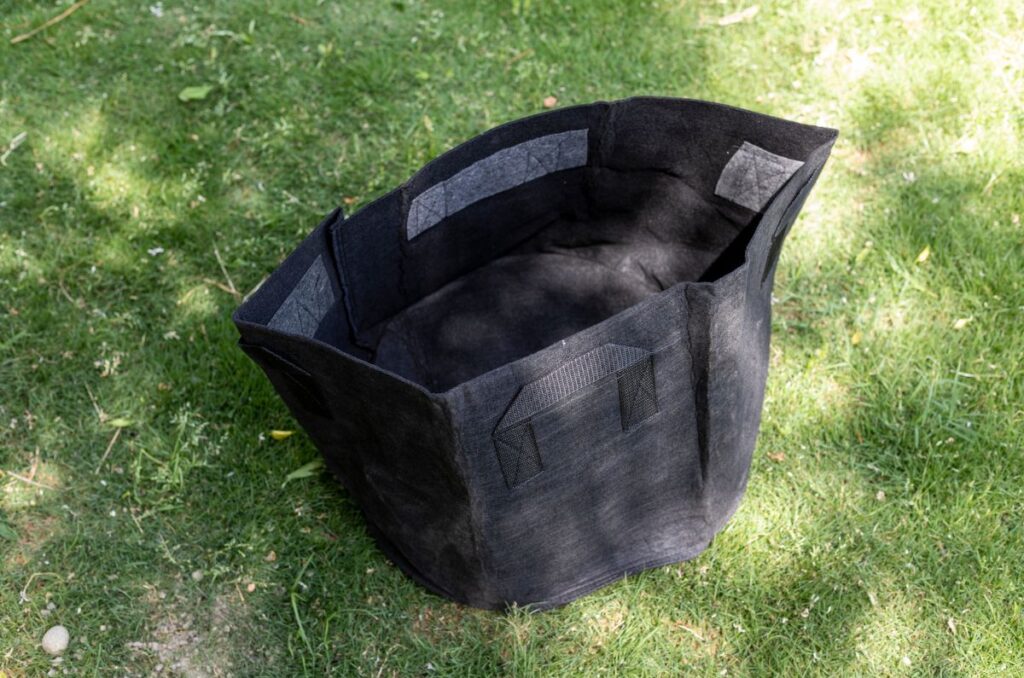 empty grow bag on grass